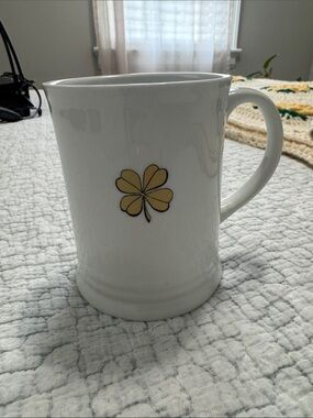 Fringe Studio White Ceramic Mug with Yellow Clover Motif